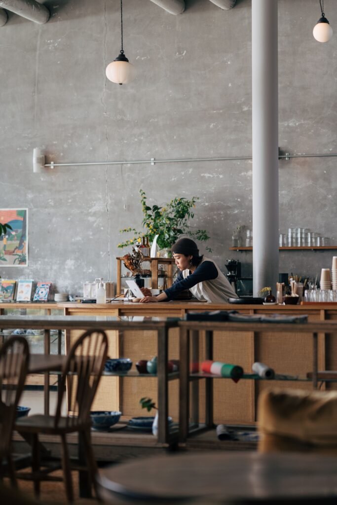 Warm and inviting cafe setting with barista in Yokosuka, Japan.